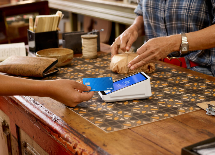 Person paying with card