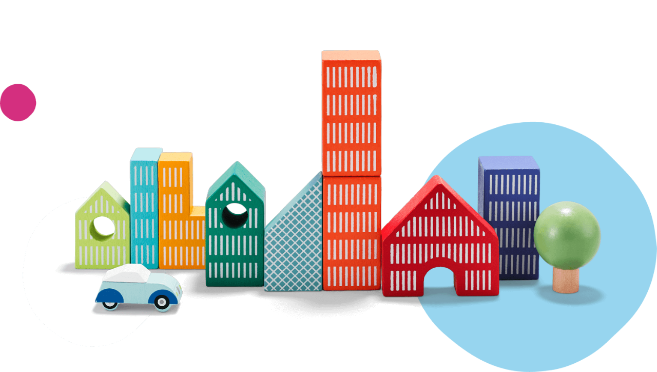 Wooden toy car and city block.
