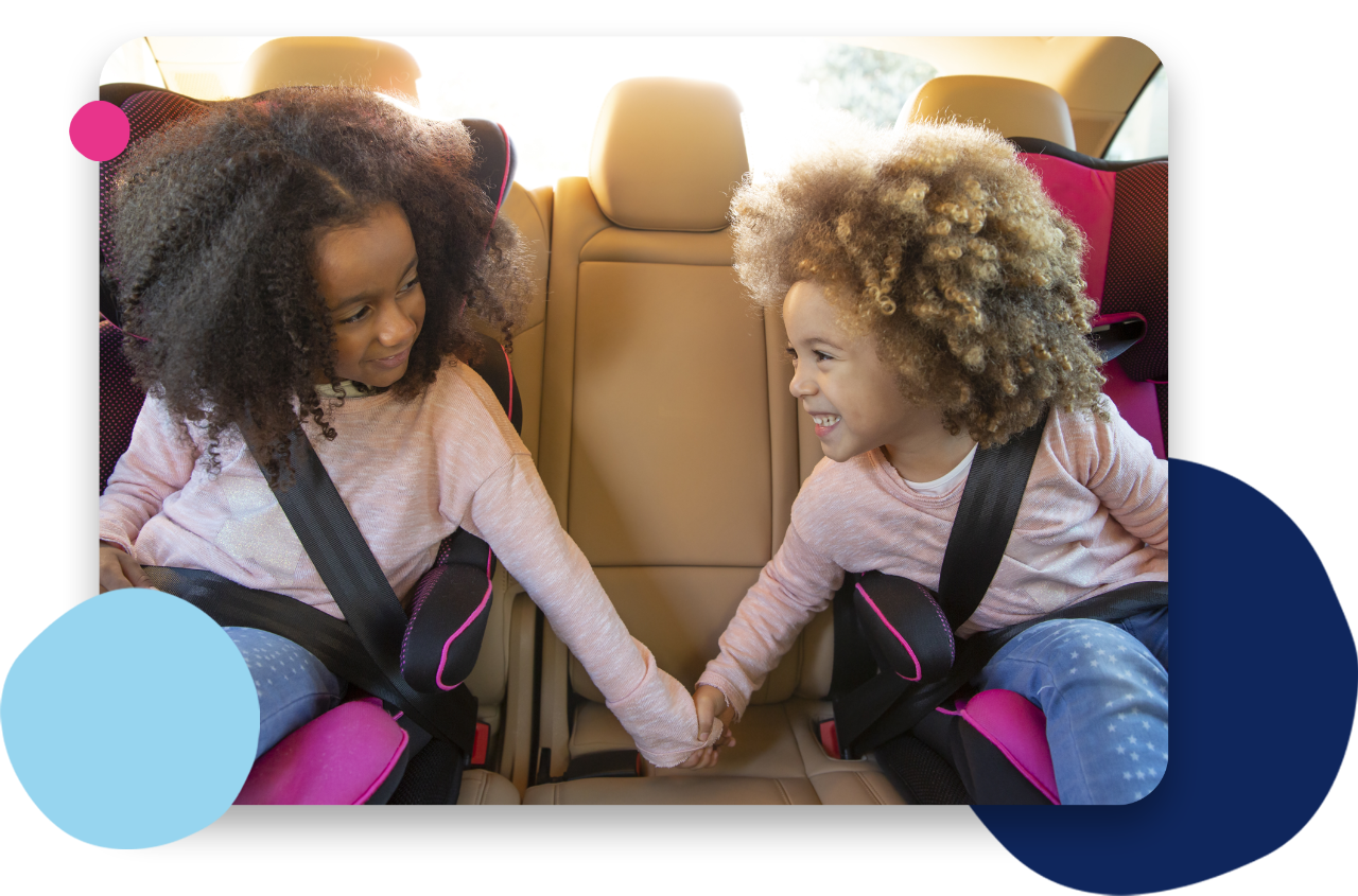 Children in car seat in car
